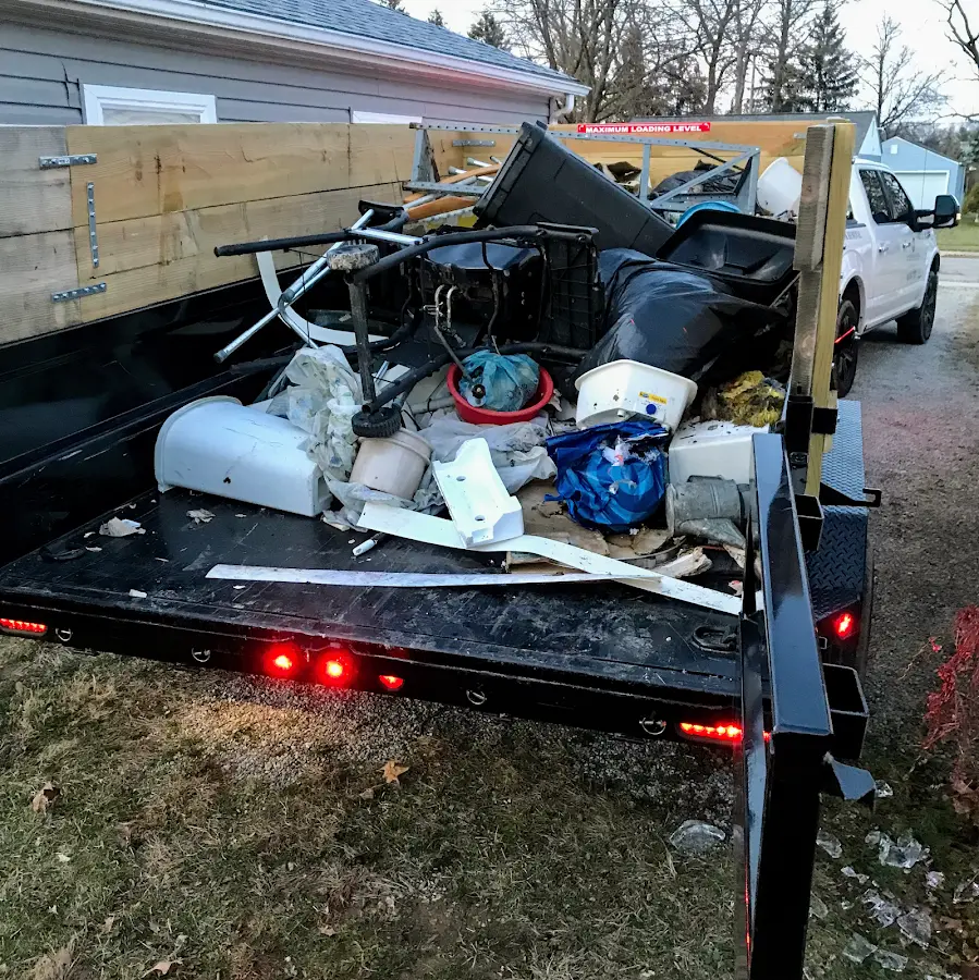 Roll-off dumpster delivered to a residential driveway in Glasgow